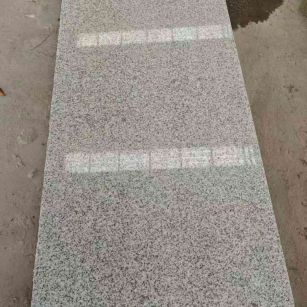 扬州芝麻白光面毛板